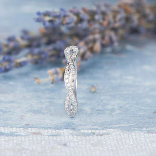 Alliance de mariage éternité à tige fendue et taille brillant rond 