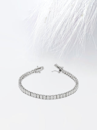 Pulsera de tenis con diamantes y moissanita de princesa en oro blanco