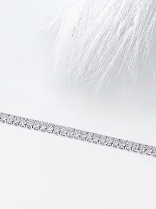 Bracelet tennis en or blanc avec diamants et moissanite à taille ovale pour elle