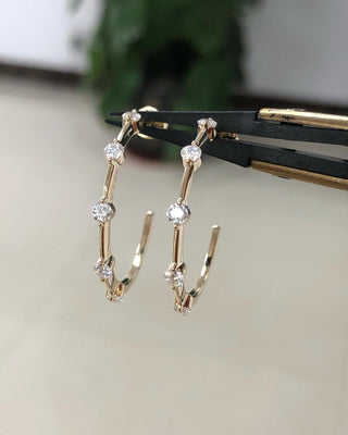 0.24 TCW Round Shaped Moissanite Open Hoop Earrings