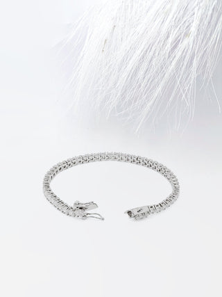 Bracelet tennis en or blanc avec diamants ronds et moissanite