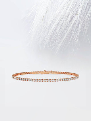 Pulsera de tenis con diamantes de moissanita de talla redonda en oro blanco de 14 quilates