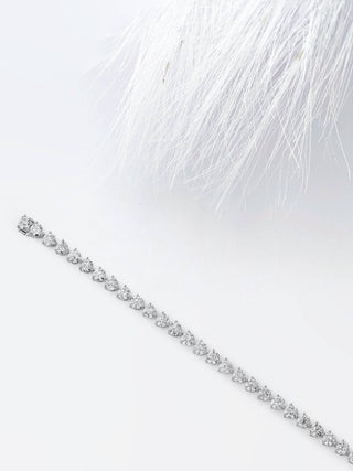 Pulsera de tenis con diamantes y moissanita redonda para mujer en oro blanco