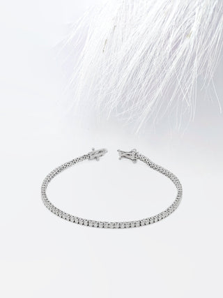 Bracelet tennis en or blanc avec diamants et moissanite taille ronde de 2,50 ct