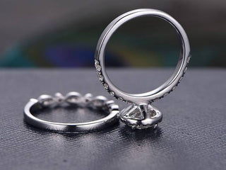 Juego de anillos nupciales de moissanita con halo de corte redondo de 1,0 ct