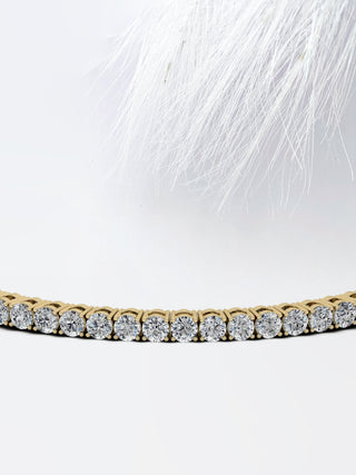 Pulsera de tenis con diamantes y moissanita redonda en oro blanco