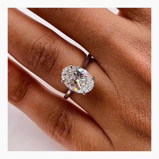 Bague de fiançailles avec diamant ovale de 2,50 à 3,50 ct avec monture halo cachée