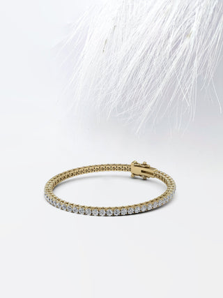 Pulsera de tenis con diamantes y moissanita redonda en oro blanco