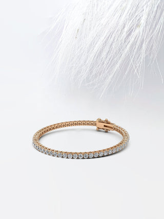 Pulsera de tenis con diamantes y moissanita redonda en oro blanco