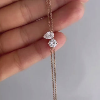 Pulsera de diamantes de moissanita de dos piedras con corte redondo y pera de 1,0 ct para mujer