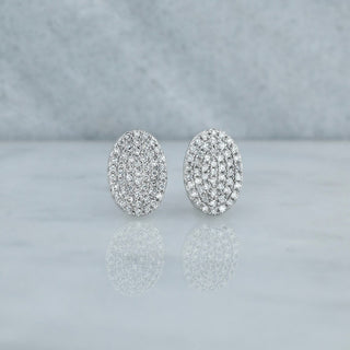 Boucles d'oreilles à tige en diamant et moissanite ronde de 0,30