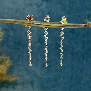 Boucles d'oreilles pendantes en diamants Moissanite ronds et baguettes de 0,77 TCW