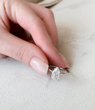 1.5 CT Pear Shaped Moissanite Hidden Halo Engagement Ring