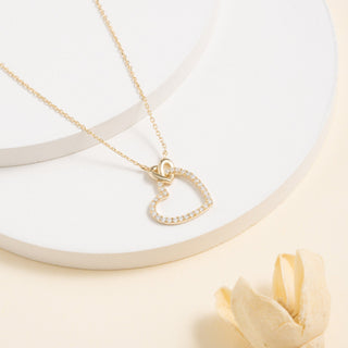 Collier en forme de cœur avec diamants taille ronde pour elle