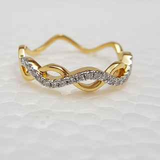 Anillo entrelazado con diamantes de talla redonda para mujer