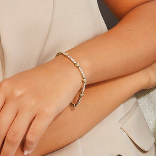 Pulsera de tenis con corazón de moissanita y diamantes redondos para ella