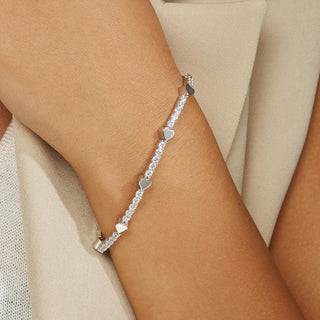 Pulsera de tenis con corazón de moissanita y diamantes redondos para ella