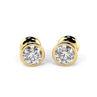 Bezel Set Round Cut Moissanite Diamond Stud Earrings in Yellow Gold