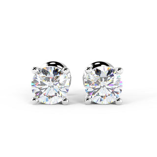 Boucles d'oreilles à tige en or blanc avec diamants et moissanite à taille ronde