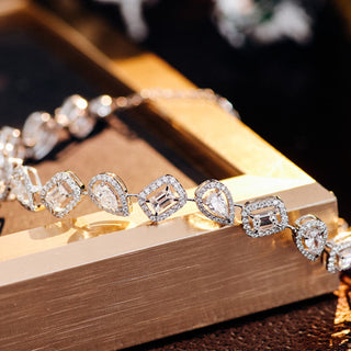 Stunning Distance Tennis Bracelet - Pear & Emerald Cut Moissanite Halo 925 Silver - Perfect Wedding Accessory - ELITE CARAT